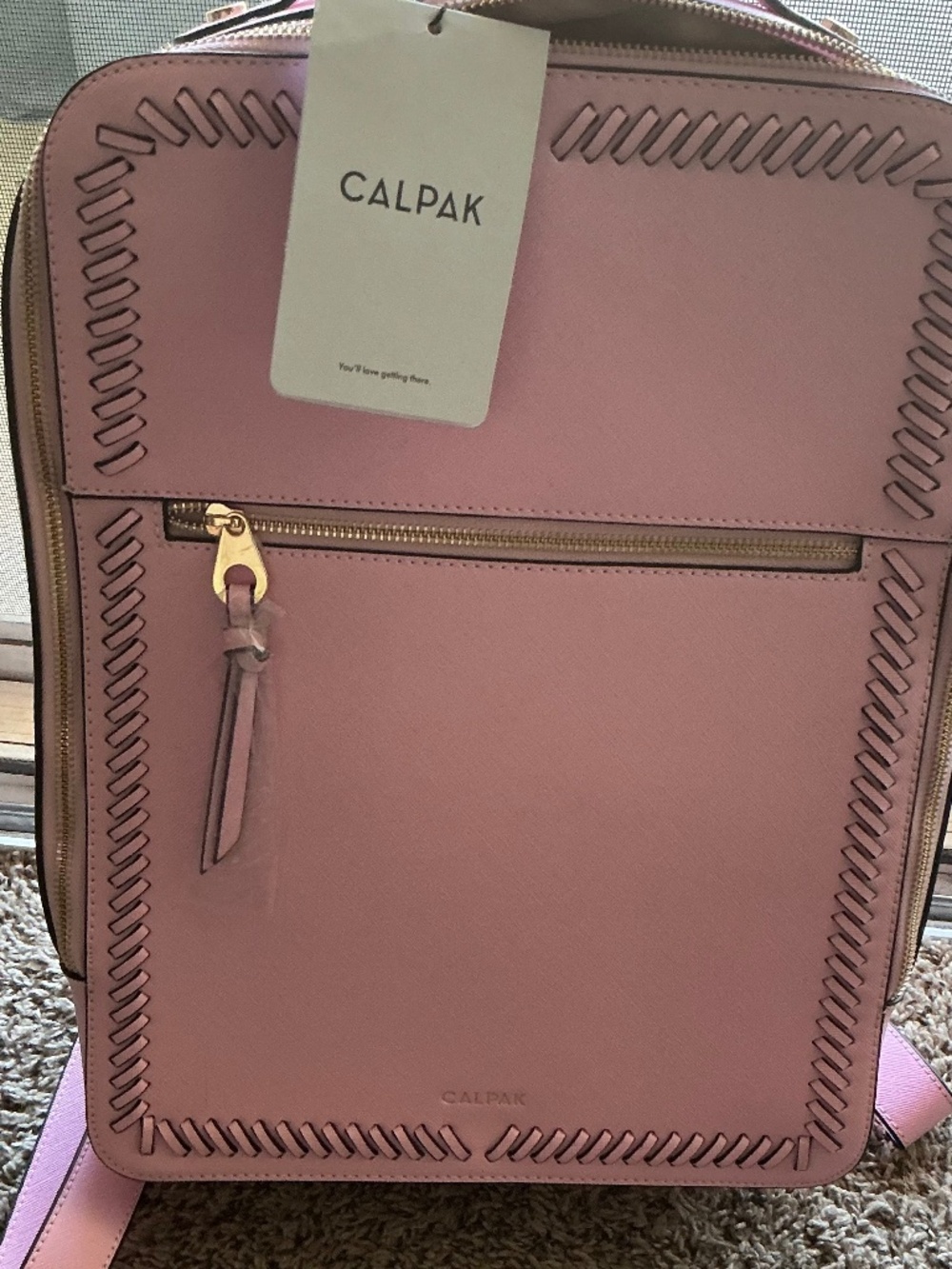 Brand new Calpak backpack, with tags , 15 inches